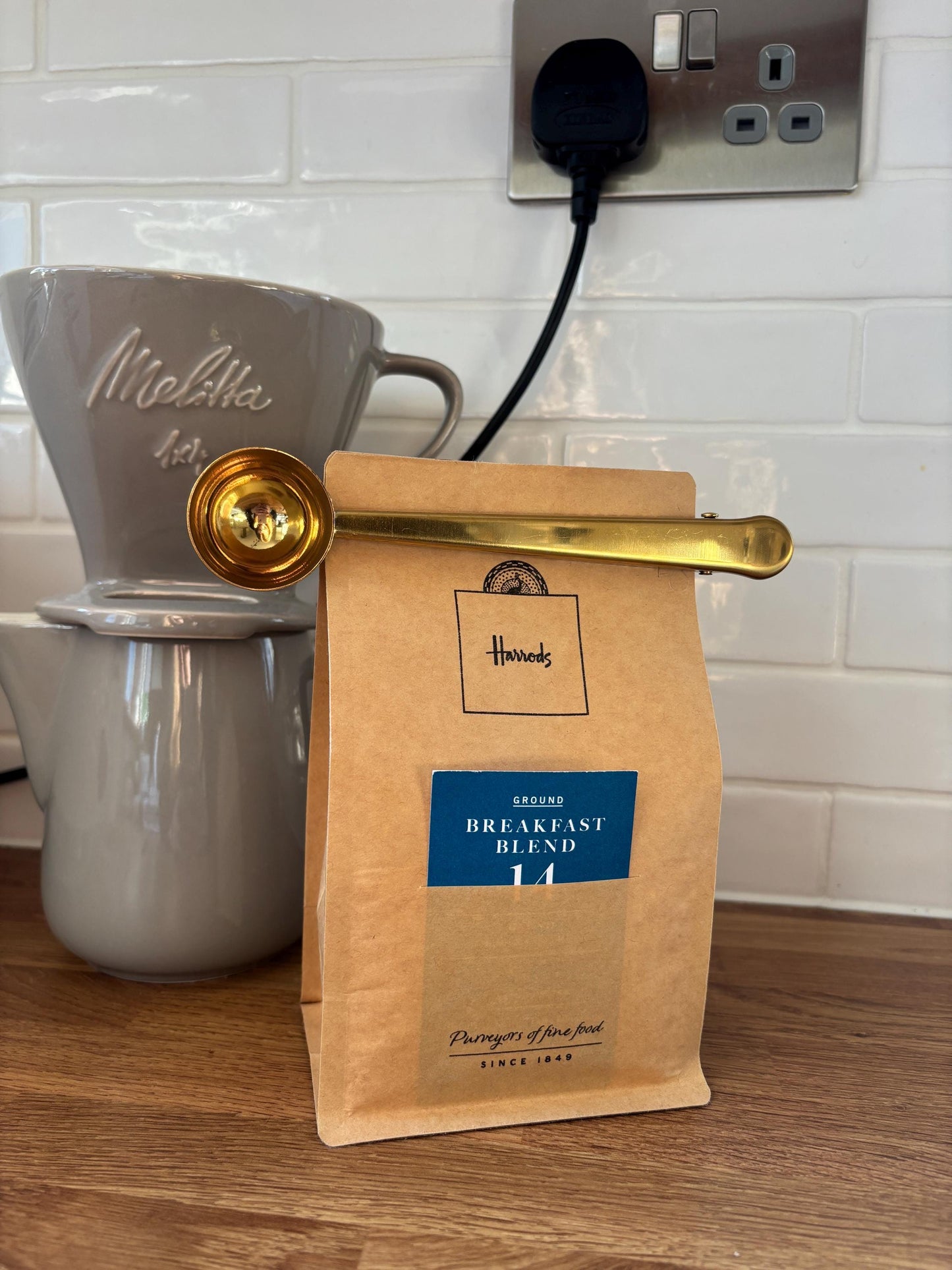 Gold coffee scoop and bag clip